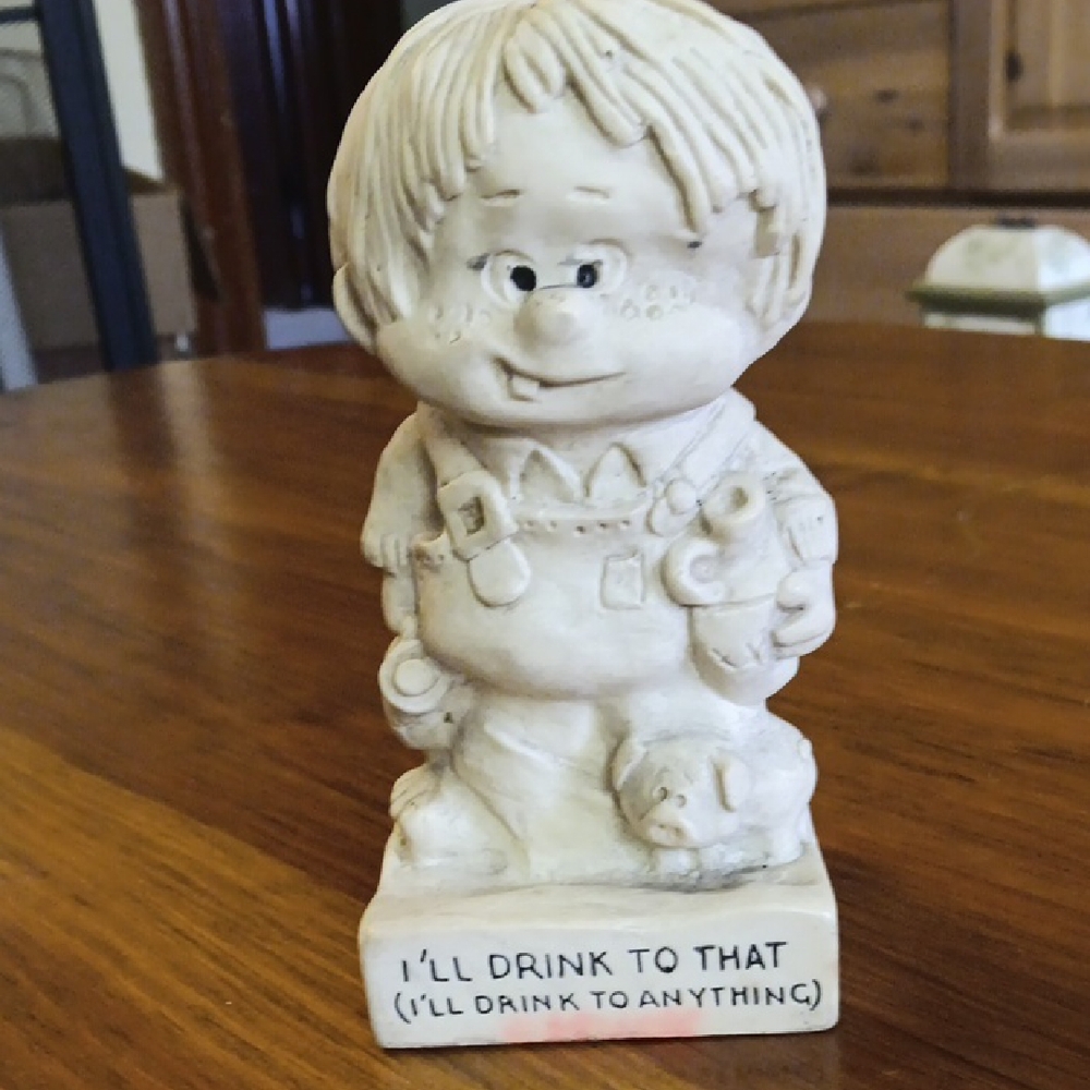 Cream Figurine with Humorous Quote